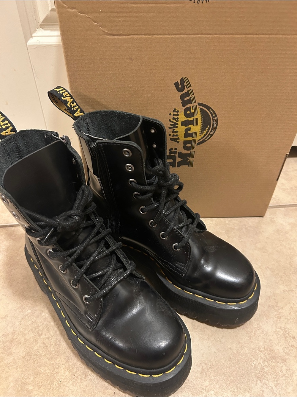 Dr. Martens Black Leather Platform Lace-Up Boots with Yellow Stitching